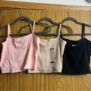 3 NIKE CROPPED TOPS
